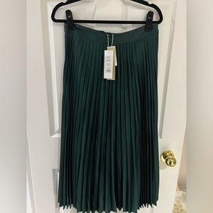 Green pleated midi skirt